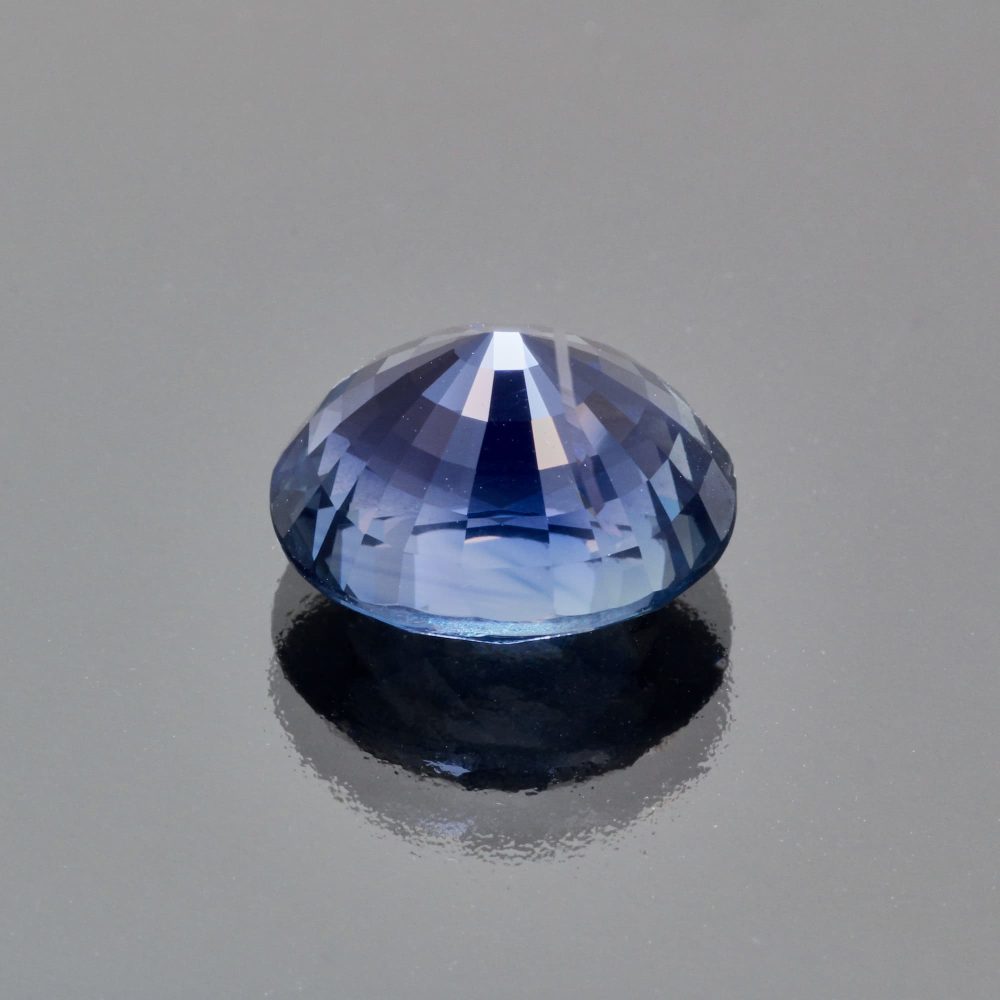 Indigo teal sapphire oval by Caram_back view